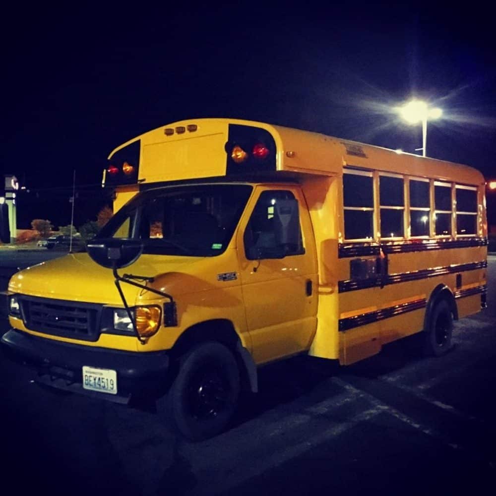 Our bus in the parking lot on the night we bought it.